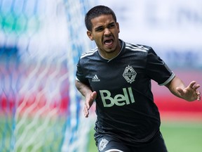 Vancouver Whitecaps' Cristian Techera celebrates his second goal against the New England Revolution during the second half of an MLS soccer game in Vancouver on Saturday May 26, 2018.