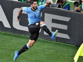 Uruguay's forward Luis Suarez celebrates after scoring during the Russia 2018 World Cup Group A football match between Uruguay and Saudi Arabia at the Rostov Arena in Rostov-On-Don on June 20, 2018.
