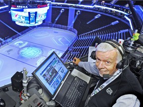 Vancouver Canucks announcer John Ashbridge looks down  onto the ice from his 5th floor perch at Rogers Arena on Friday, March 18, 2011.