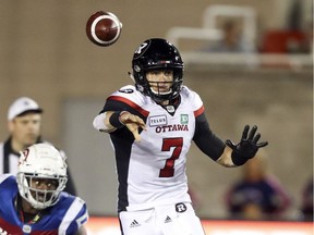 Ottawa Redblacks quarterback Trevor Harris passes the football during Canadian Football League game against the Montreal Alouettes in Montreal Friday July 6, 2018.
