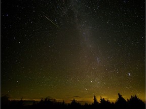 In this NASA handout, a 30 second exposure of a meteor streaks across the sky during the annual Perseid meteor shower August 12, 2016 in Spruce Knob, West Virginia. The annual display, known as the Perseid shower because the meteors appear to radiate from the constellation Perseus in the northeastern sky, is a result of Earth's orbit passing through debris from the comet Swift-Tuttle.