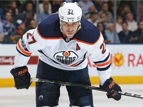 Milan Lucic of the Edmonton Oilers waits for a face-off against the Toronto Maple Leafs during an NHL game at the Air Canada Centre on December 10, 2017 in Toronto.