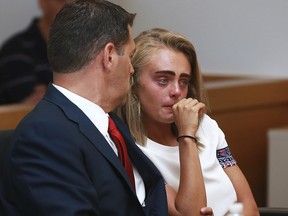 Michelle Carter awaits her sentencing in a courtroom in Taunton, Mass., Thursday, Aug. 3, 2017, for involuntary manslaughter for encouraging Conrad Roy III to kill himself in July 2014.