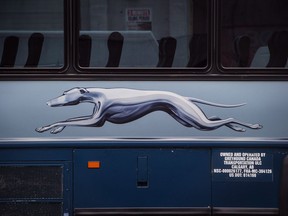 The Greyhound logo is seen on one of the company's buses, in Vancouver, on Monday July 9, 2018.