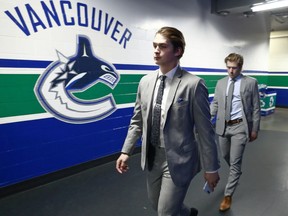 Jake Virtanen and Brock Boeser, right, are among the players the Vancouver Canucks will be counting on to ignite the offence this NHL season.