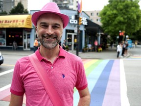 Glenn Tkach, pictured at the rainbow crosswalk at Bute and Davie streets in Vancouver on Monday, July 9, 2018.