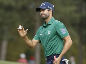 Adam Hadwin, of Canada, reacts after a birdie on the eighth hole during the second round at the Masters golf tournament Friday, April 6, 2018, in Augusta, Ga. In a recent video posted to Instagram, Hadwin was preparing for this week's British Open by hitting balls in his backyard in Phoenix.