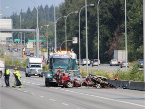 A crash between an SUV and a tractor trailer closed Highway 1 in Langley for several hours Saturday morning.