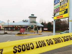 A man who was charged with murder in Burnaby more than a decade ago has finally been arrested in South Korea and was extradited back to Canada last week. This is a file image of the shooting scene on Jan. 23, 2006, the morning after two were shot.
