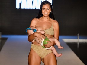 Model Mara Martin walks the runway for the 2018 Sports Illustrated Swimsuit show at PARAISO during Miami Swim Week at The W Hotel South Beach on July 15, 2018 in Miami, Fla.