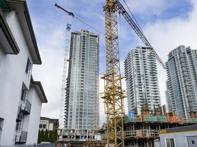 Condo towers under construction near Metrotown, where older walkup rental units are being torn down for new towers.