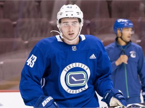 Canucks draft pick Quinn Hughes takes the ice for the first time in a Vancouver Canucks jersey during prospect camp in Vancouver on Tuesday.