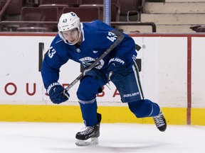 Quinn Hughes took to the ice Tuesday after battling flu bug.