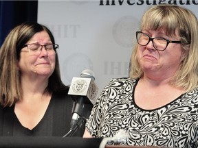 The late Paul Bennett’s sister Jackie Arthur (left) and his widow Darlene Bennett struggle to control their emotions during a news conference in Surrey on Thursday, as they made an appeal for the public’s help in finding his killer.