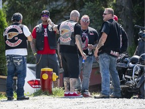 Members Hells Angels gather out front of the Nanaimo Hell Angels' clubhouse in Nanaimo, BC, July, 21, 2018.