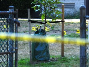 Vancouver Police on the scene of the city's 12th homicide of the year, this one on the grounds of Tillicum Community Annex school on July 26, 2018.