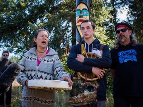 Kwitsel Tatel speaks to the media during a news conference at Camp Cloud near the entrance of the Kinder Morgan Trans Mountain pipeline facility in Burnaby on Saturday, July 21, 2018.