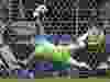 England goalkeeper Jordan Pickford makes The Save during the penalty segment in the Round of 16 World Cup match against Colombia in Moscow on July 3. England now plays Sweden in the quarterfinals.