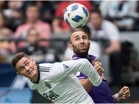 Vancouver Whitecaps' Jake Nerwinski, left, said one of his team’s goals this season was to take back the Voyageurs Cup, a trophy the Whitecaps won in 2015.