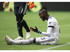 Vancouver Whitecaps' Kei Kamara (23) reacts after missing a shot during first half MLS soccer action against the Colorado Rapids, in Vancouver on Sunday, July 1, 2018.