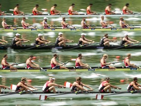 The rowing teams of Canada, Netherlands 2, New Zealand, Poland and China, from bottom, during the men's eight at the rowing World Cup on Lake Rotsee in Lucerne, Switzerland.