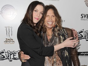 Actress Liv Tyler and singer Steven Tyler arrive at the premiere of IFC Midnight's 'Super' at the Egyptian Theatre on March 21, 2011 in Hollywood, Calif.