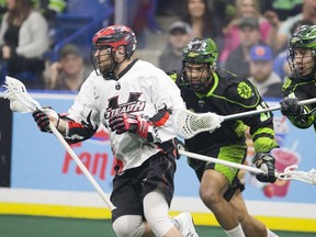 Vancouver Stealth defender Andrew Suitor, left, has been dealt to the New England Black Wolves as the Vancouver Canucks begin their rebuild of the National Lacrosse League team, which will be renamed and rebranded next month by the new NHL owners.