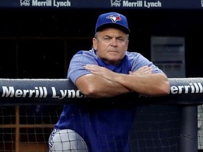 John Gibbons #5 of the Toronto Blue Jays looks on in the first inning against the New York Yankees at Yankee Stadium on August 17, 2018 in the Bronx borough of New York City.