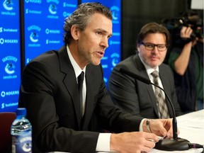 Trevor Linden and Francesco Aquilini on the day that Linden was named team president. They were all smiles that day, but four years later Linden is no longer part of the Vancouver Canucks.