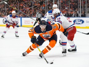 In this March 3 file photo, Edmonton Oilers forward Connor McDavid handles the puck against the New York Rangers.