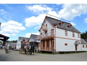 The Barnard Express stagecoach takes a load of tourists through the Barkerville Historic Town and Park in the Cariboo on July 18.