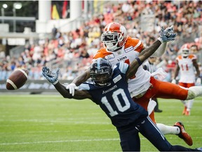 Argonauts receiver Armanti Edwards reaches for a catch in fourth quarter CFL action against the B.C. Lions.