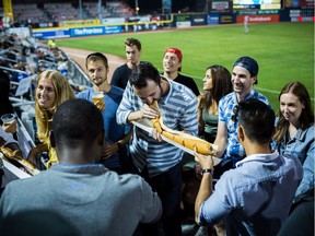 Going to Nat Bailey Stadium has become a summer staple for people from all corners of Metro Vancouver. Baseball fans chomped down on three-foot-long hotdogs during the Aug. 15 Vancouver Canadians and Tri-City Dust Devils game at The Nat.