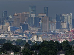 Downtown Vancouver is shrouded in haze, largely caused by the forest fires in the B.C. Interior.