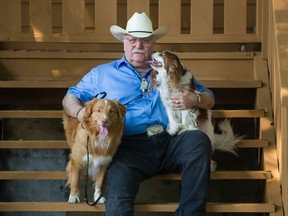 Stan Coren with his dogs Ranger (left) and Ripley at his home in Vancouver.