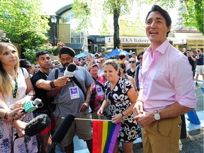 Prime Minister Justin Trudeau with Minister of Foreign Affairs Chrystia Freeland at the 40th Annual Pride Parade in Vancouver on Sunday.