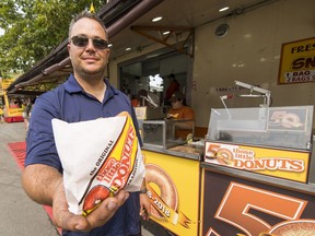 Nathan Mire, owner of Those Little Donuts, which is celebrating its 50th anniversary at The Fair at the PNE, with a sampling of his irresistible wares.