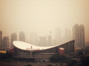 The Calgary skyline is covered in a blanket of forest fire smoke blown in from the B.C. fires. August 15, 2018.