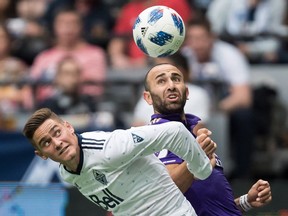 Jake Nerwinski of the Vancouver Whitecaps, left, says his squad needs to stay focused for 90 minutes when it plays at Yankee Stadium on Saturday.