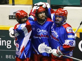 Curtis Dickson (centre) is congratulated by Peterborough Lakers teammates after scoring in last season’s Ontario-based Major Series Lacrosse final series. Dickson is suiting up for the WLA-champion Maple Ridge Burrards this summer.