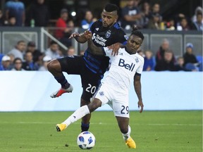 Vancouver Whitecaps forward Yordy Reyna controls the ball against San Jose Earthquakes midfielder Anibal Godoy during the first half at Avaya Stadium on Saturday night. Reyna had a goal and an assist in the 3-2 victory.