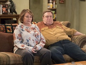 In this image released by ABC, Roseanne Barr, left, and John Goodman appear in a scene from the reboot of "Roseanne."