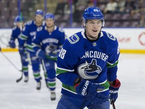 Vancouver Canucks centre Adam Gaudette (88) celebrates his first period goal against the Winnipeg Jets during the Young Stars Classic at the South Okanagan Events Centre.