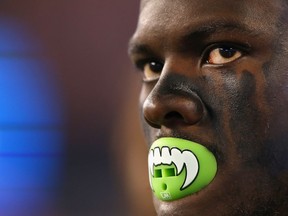 Defensive lineman Frank Clark of the Seattle Seahawks looks on from the sidelines during a November 2016 NFL game in Foxboro, Mass.