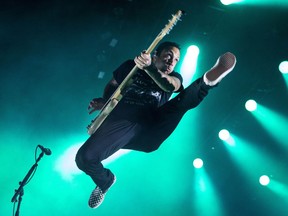 Joe Principe of Rise Against performs at Wrigley Field in Chicago, Saturday, Sept. 8, 2018.