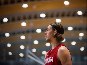 Canadian men's national basketball team centre Kelly Olynyk, of the NBA’s Miami Heat, waits for a pass while shooting at the end of practice in Richmond in June 2018.