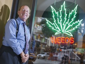 Don Briere, owner of Weeds Glass and Gifts, outside his Richards St. cannabis store.