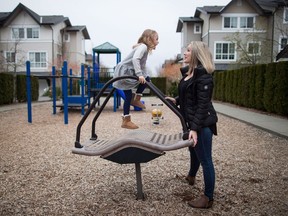 Rahel Staeheli plays with her daughter Milani Staeheli-Hildebrand, 5, at a playground near their home in Surrey, B.C., on April 11, 2018. Rahel Staeheli had her daughter on three wait lists for a spot in French immersion but Milani didn???t get into any of them when she started school last week. Staeheli is among parents across the country who say a lack of French-immersion teachers is depriving their kids of a bilingual education.