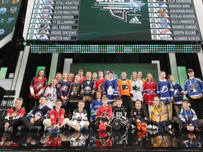 Pictured above, draft runners pose for a group photo following the 2018 NHL Draft at American Airlines Center on June 23, 2018 in Dallas, Texas.