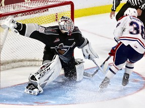 Vancouver Giants goalie David Tendeck makes a save on Sunday against the Spokane Chiefs.